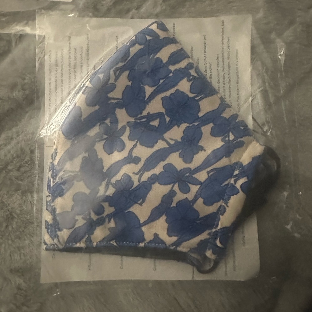 Brand new. Women’s Tory Burch blue and White Mask